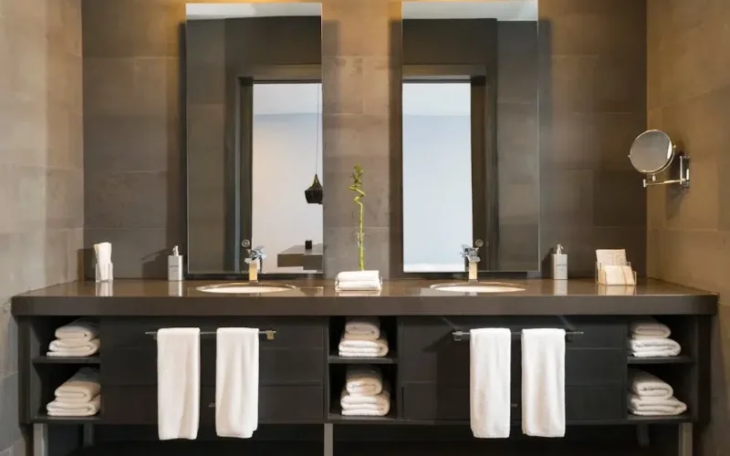 Two vanity mirrors in a modern master bath